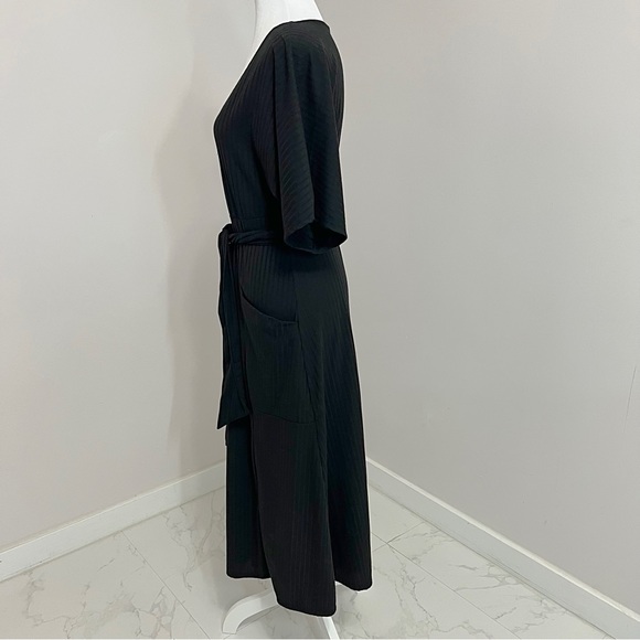 Rolla Coster Plunging Black Wrap Dress with
Flutter Sleeve Size: L - Picture 13 of 16